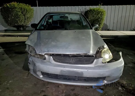 1999 Honda Civic Dx z USA, uszkodzony, nr VIN 100158